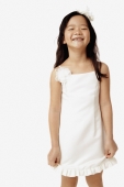 Girl in white dress, smiling - Erik Soh
