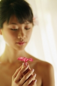 Portrait of a young woman, holding a flower - Alex Microstock02