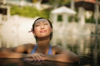 Young woman, at edge of swimming pool - Alex Microstock02