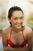 Young woman in a  swimming pool, smiling - Alex Microstock02