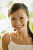 Young woman looking at camera, smiling - Alex Microstock02