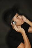 Young man with headphones, black background - Alex Microstock02