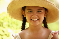 Young girl smiling, wearing hat - Jack Hollingsworth