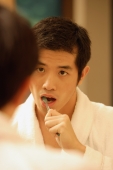 Young man brushing his teeth - Alex Microstock02