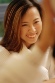 Woman smiling, focus on the background - Alex Microstock02