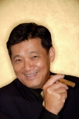 Man with cigar looking at camera, smiling - Alex Microstock02