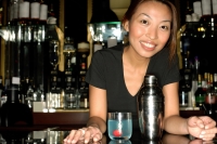 Bartender leaning on counter, looking at camera - Alex Microstock02