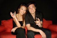 Couple with drinks, looking at camera - Alex Microstock02