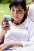 Woman using mobile phone, text messaging - Alex Microstock02
