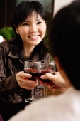 Couple toasting with wine glasses - Alex Microstock02
