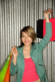  Young woman with shopping bags, smiling - Alex Microstock02