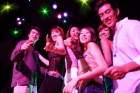 Young adults at night club, dancing in a row - Alex Microstock02