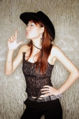 Young woman, hands on hip, wearing cowboy hat - Alex Microstock02