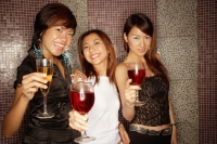Young women with drinks, smiling and looking at camera - Alex Microstock02