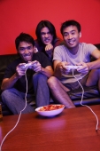  Three young men, playing video games - Alex Microstock02
