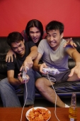 Young men at home playing with video games - Alex Microstock02