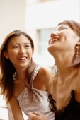  Young women side by side, smiling and laughing - Alex Microstock02