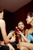 Young adults with drinks, low angle view - Alex Microstock02