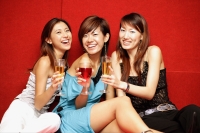 Young women with drinks, smiling at camera - Alex Microstock02