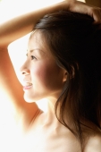 Young woman in profile, hand on head - Alex Microstock02