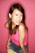 Young woman in pink top, looking at camera - Alex Microstock02
