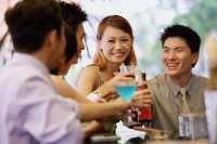 Young adults at bar counter, with drinks - Alex Microstock02