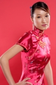 Woman in Cheongsam, hand on hip, looking at camera - Alex Microstock02