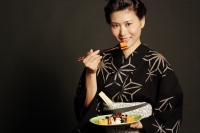 Woman in Japanese costume, eating sushi - Alex Microstock02