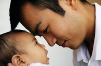 Father bonding with baby daughter - Jade Lee