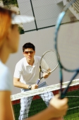 Woman holding tennis racket, playing tennis - Alex Microstock02
