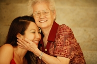 Grandmother with granddaughter, portrait - Jade Lee