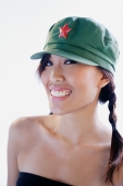 Woman wearing cap, smiling at camera - Alex Microstock02