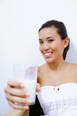 Woman holding glass of milk - Alex Microstock02