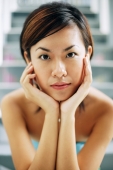 Young woman, looking at camera, hands on face - Alex Microstock02