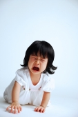 Baby girl crawling on floor, crying, mouth open - Alex Microstock02