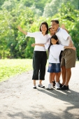 Family standing together, smiling - Alex Microstock02