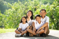 Family looking at camera, smiling - Alex Microstock02
