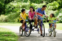 Family in park, riding bicycles - Alex Microstock02