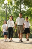 Family with two children, walking hand in hand - Alex Microstock02
