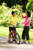 Mother and son giving high fives - Alex Microstock02