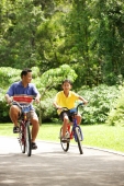 Father and son cycling, side by side - Alex Microstock02