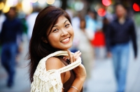 Young woman looking at camera, smiling - Alex Microstock02