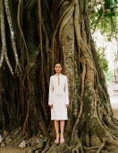 Eurasian model standing in front of Banyan tree - Martin Westlake