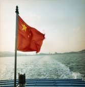 Chinese flag on ferry, late afternoon - Martin Westlake