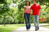 Couple walking in park, holding hands - Alex Microstock02