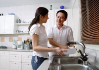 Couple in kitchen, washing dishes - Alex Microstock02
