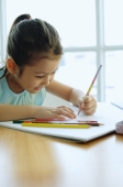 Young girl holding pencil, drawing - Alex Microstock02