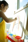 Young girl with apron, painting a rainbow - Alex Microstock02
