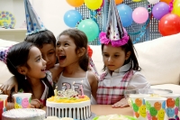 Children at a birthday party having a good time - Alex Microstock02