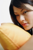 Woman with pillow, looking away - Alex Microstock02